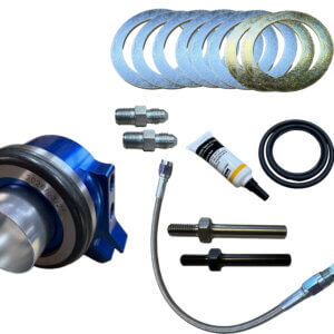 Hydramax blue hydraulic release bearing kit for Ford, with shims, fittings, O-rings, bolts, hose, and lubricant displayed.